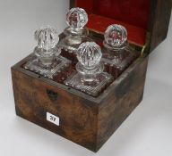 A burr walnut four bottled decanter box