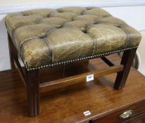 A leather button stool, W.58cm