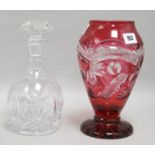 A ruby cut glass vase and a decanter