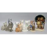 Two Hummel figures of children and a collection of cat figures by Royal Doulton, Beswick and