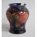 A Moorcroft pomegranate small vase