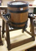 An Antique butter churn on stand, marked "Shakespearian Hathaway Maker, Chippenham", (Registered