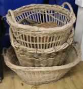 Three wicker baskets and a fishing creel, largest W.78cm