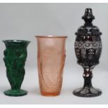 A malachite vase, a Deco vase and an overlay vase and lid