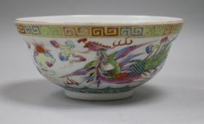 A Chinese famille rose dragon and phoenix bowl