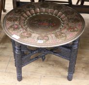 An Indian brass top table, W.61cm