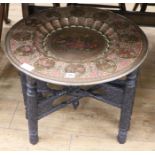 An Indian brass top table, W.61cm