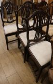 A set of six Hepplewhite style dining chairs