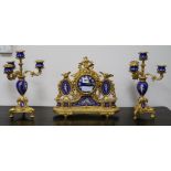 A French ormolu and Sevres style clock garniture