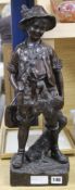 A bronze figure of a peasant boy, signed on base Auguste Moreau