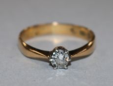 A 22ct gold and solitaire diamond ring, size P.