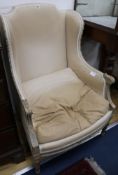 A French carved wing chair