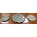 Three Islamic brass dishes, Largest W.55cm