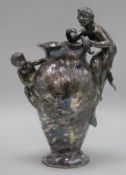 A WMF figurative vase decorated with a fisherman