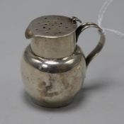 A late Victorian novelty silver pepperette modelled as milk can, Saunders & Shepherd, Chester, 1895,