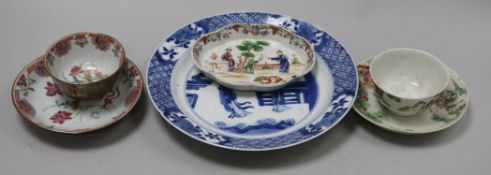 A Kangxi blue and white plate, two Qianlong tea bowls and saucers and a spoon tray