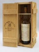 An opened bottle of The Macallan Over 25 years Old Anniversary Malt, distilled 1968, bottled 1993,