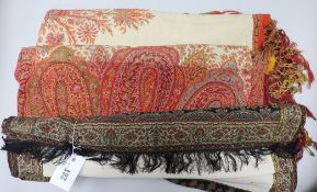 A paisley stole and a cream Norwich style paisley shawl