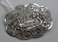 A 19th century Dutch white metal pierced and embossed brooch, 60mm.