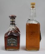 A bottle of Single Barrel Jack Daniels and an 1895 Replica bottle Jack Daniels