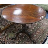 A George III mahogany tea table, with dished top and acanthus carved tripod, W.85cm