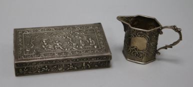 A Chinese silver box and a late 19th century German silver milk jug.