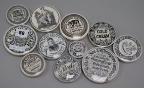 Ten Victorian ointment and cold cream pot lids, including Holloway's Ointment and Mrs Ellen Hale's
