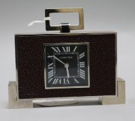 A Cartier Art Deco style chrome and faux shagreen desk alarm timepiece, height 8.5cm over handle.