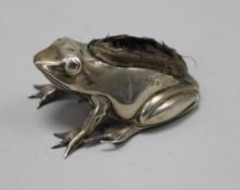 An Edwardian novelty silver mounted pin cushion, modelled as a frog, marks rubbed, Birmingham,