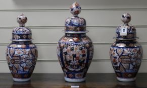 Three Japanese Imari vases and covers, late 19th century