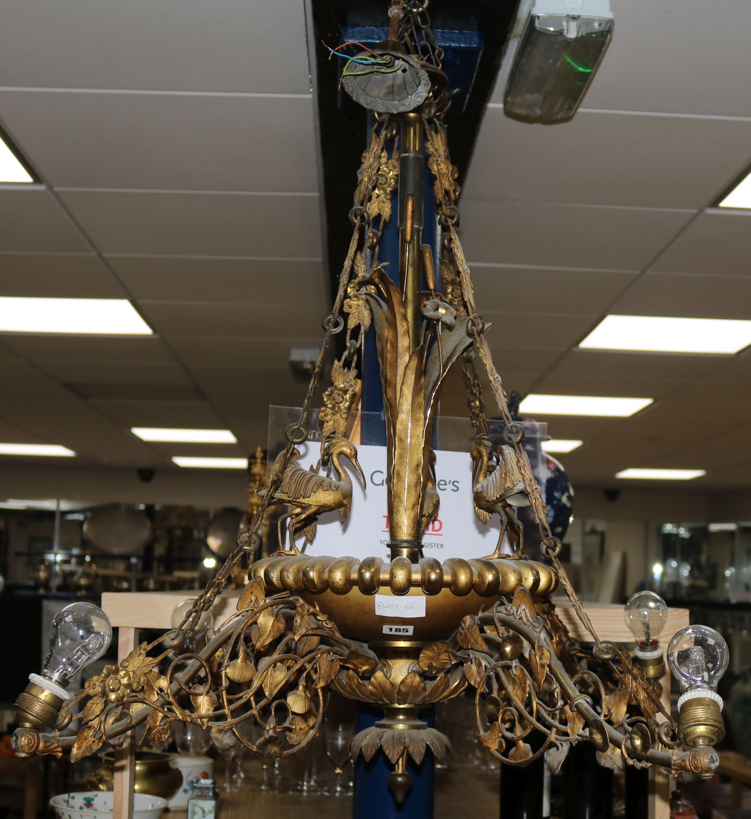 A 19th century French cast gilt metal four branch ceiling chandelier, the plaffonier mounted with