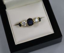 A gold and graduated five stone sapphire and diamond half hoop ring, each diamond weighing