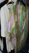 A cream 1920's silk dress and stripe and gold lace evening coat