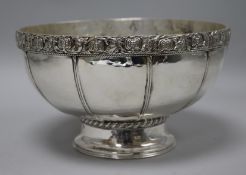 An Edward Spencer silver plated circular pedestal bowl, with decorated frieze, 21cm