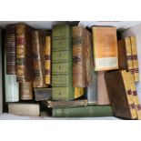 A box of leather bindings including The Edinburgh Review