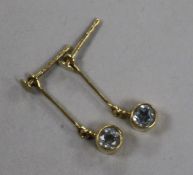 A pair of 9ct gold and aquamarine set drop earrings.