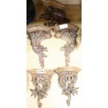 Five carved painted brackets
