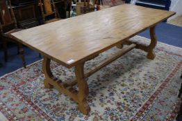 A Spanish style elm refectory table W.222cm