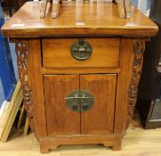 A Chinese hardwood low cupboard, W.63cm