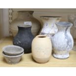A group of Chinese pigment painted pottery vessels and a sgraffito jar, Neolithic or later