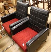 A pair of black and red 1960's armchairs
