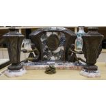 A French Art Deco marble and metal figural mounted clock garniture