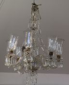 A large Victorian eight branch glass chandelier