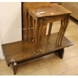 An Ercol coffee table and a nest of three walnut tea tables, W.107cm. Nest W.50cm