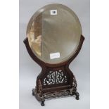 A Chinese hardwood mirror