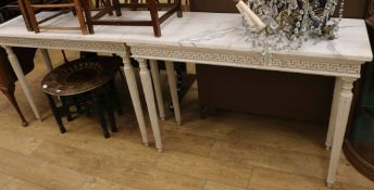A pair of marble topped console tables, W.126cm