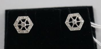 A pair of pierced 18ct white gold and diamond set hexagonal ear studs.