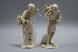 Two Japanese sectional ivory figures of farmers