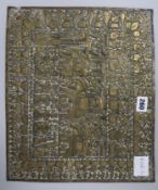 An Indian brass repousse-work panel, 18th/19th century, decorated with a procession of figures, 31cm