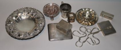 An antique continental white metal cup, six silver items including cigarette case and compact and